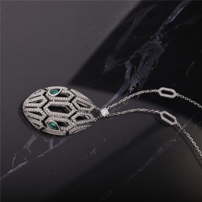 Italy Luxury Serpenti Necklace in 18K White Gold set with Emerald Eyes and with pavé diamonds on the Chain and the Head